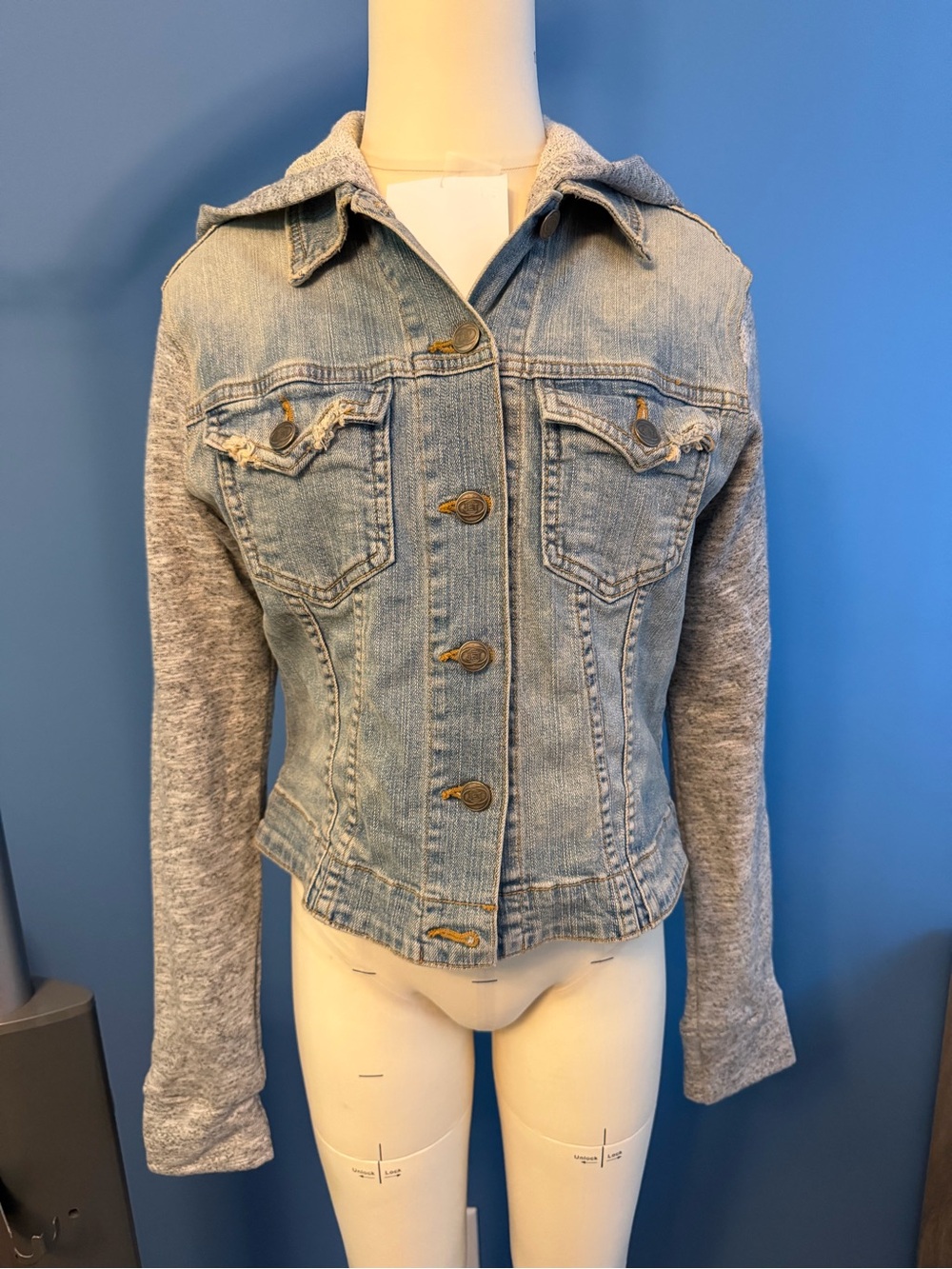Light Blue Denim Jacket with Gray Knit Sleeves and Hood
